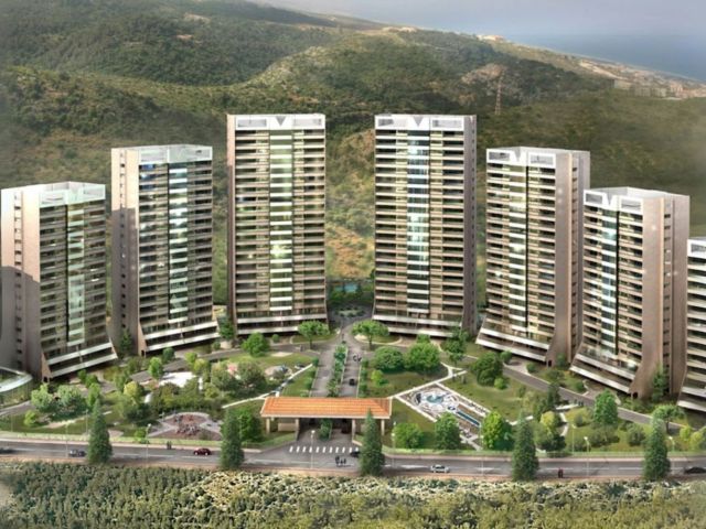 High-rise residential towers with landscaped gardens and amenities