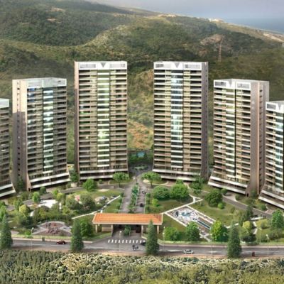 High-rise residential towers with landscaped gardens and amenities