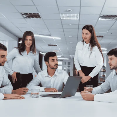 Elevator industry professionals collaborating in a modern office